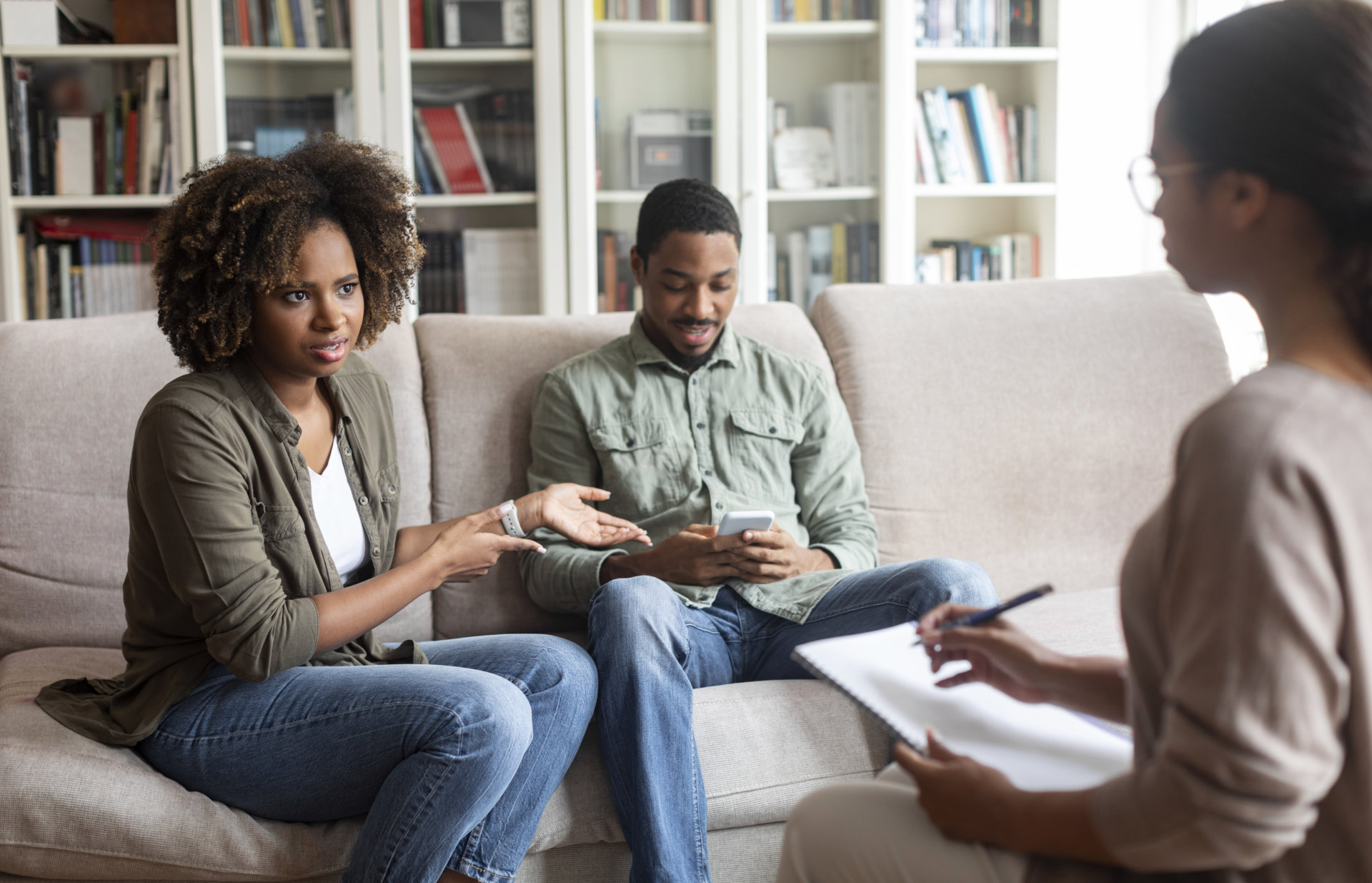 couple talking to a woman